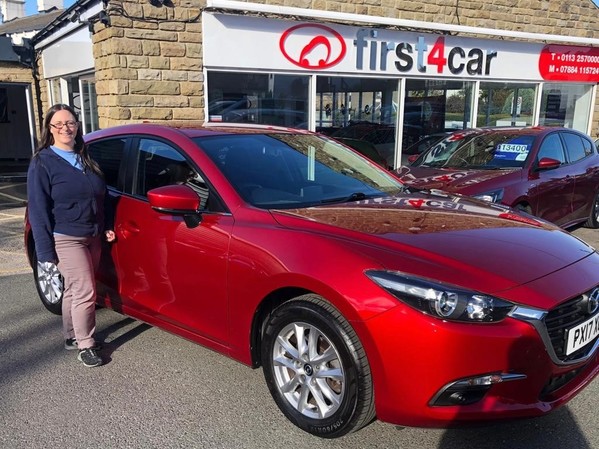 Helen collecting her Mazda after her last Mazda was written off